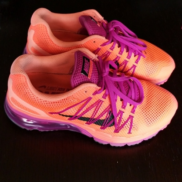 orange and purple tennis shoes